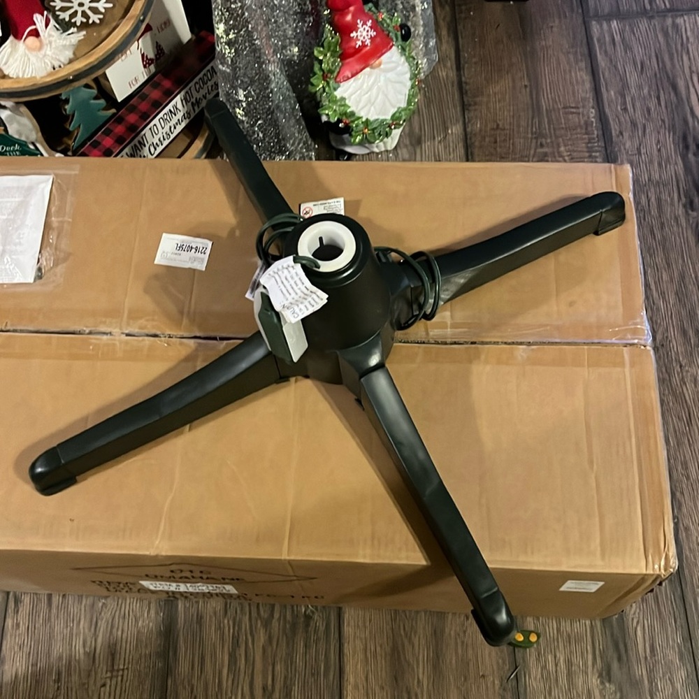 Rotating artificial tree stand